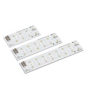 A group of XR HL2X LED lights in various angles, showcasing their sleek design and bright illumination.