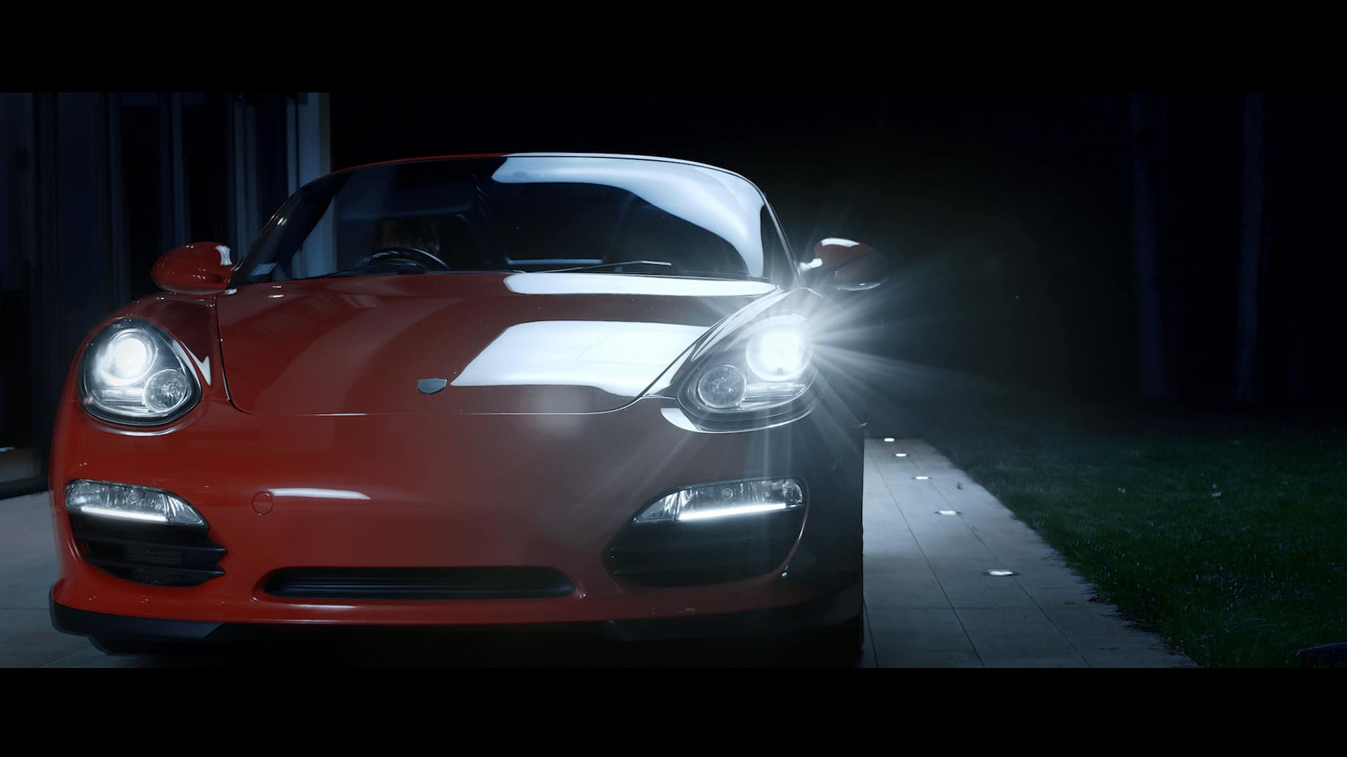 Image of a Porsche car showcasing Philips LED headlights, highlighting modern design and advanced lighting technology.