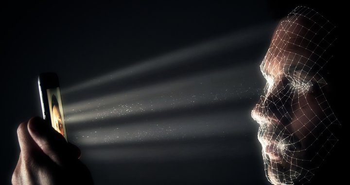 Infrared facial recognition technology showcased with a close-up of a person's face and infrared patterns.